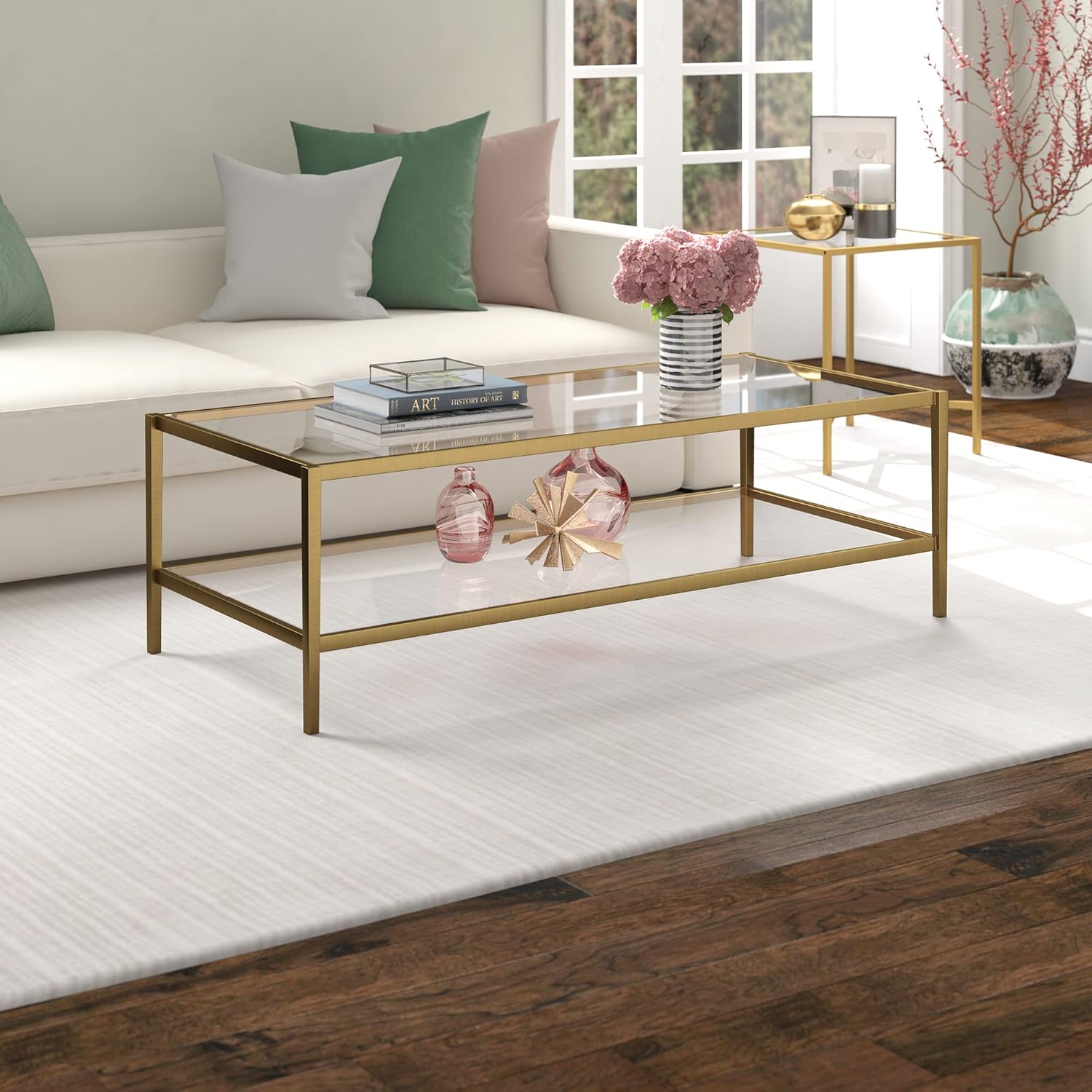 Henn&Hart 54" Wide Rectangular Coffee Table with Glass Shelf in Antique Brass, Modern coffee tables